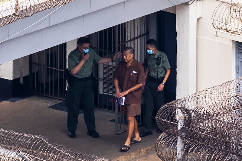 Jimmy Lai walks through the Stanley prison in Hong Kong, on July 28, 2023.